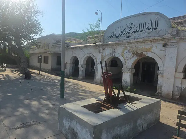 A front view of Khewra Railway Station, with its rusting signal levers standing idle.