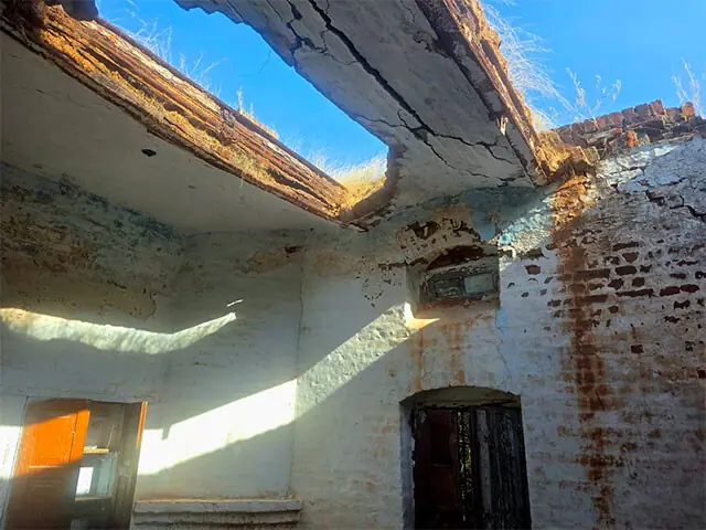 The crumbling roof of one of the residential quarters at Khewra Railway Station.