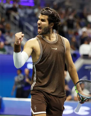 SPAIN’S Carlos Alcaraz celebrates after winning the US Open second-round match against Jaime Faria of Portugal at the Flushing Meadows.—Reuters