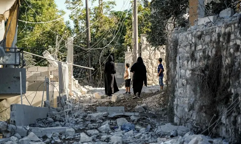 Residents inspect the destruction the morning after a night airstrike by the Israeli military that targeted the southern Lebanese village of Mayfadoun on September 5, 2026. &mdash;AFP
