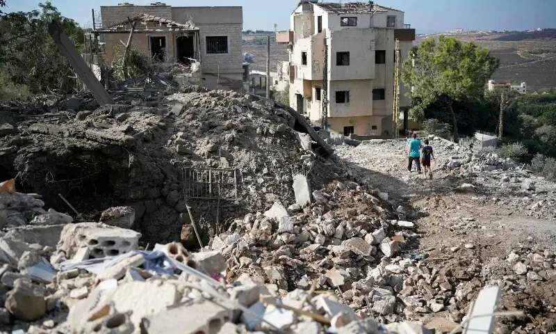 Residents inspect the destruction the morning after a night airstrike by the Israeli military that targeted the southern Lebanese village of Mayfadoun on September 5, 2026. &mdash;AFP