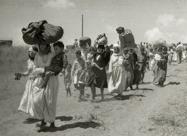  Women and children being forced to leave from the Palestinian village of Tantura, three weeks after the Israeli takeover in 1948, during what would come to be referred as the Nakba: it is clear from statements by various Zionist leaders that this policy of expelling and exterminating the Palestinians was, and remains, a deliberate one | Benno Rothenberg Collection 