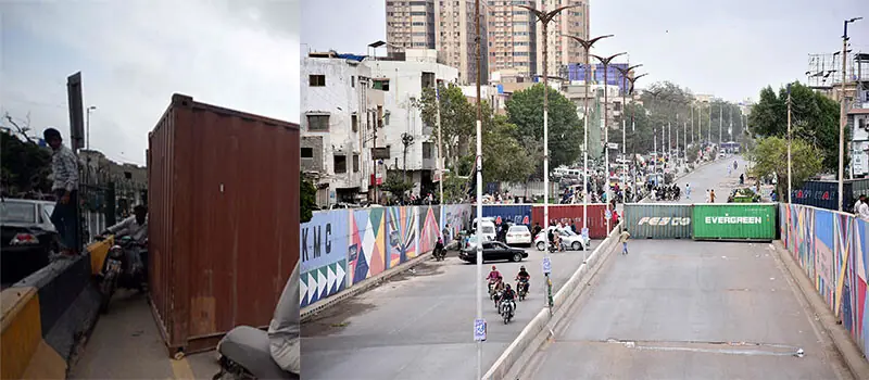   A motorcyclist and a pedestrian struggle to continue their journey despite roadblocks, as commuters (right) are forced to turn around after Shahrah-i-Quaideen was blocked with containers.&mdash;PPI / Shakil Adil / White Star  