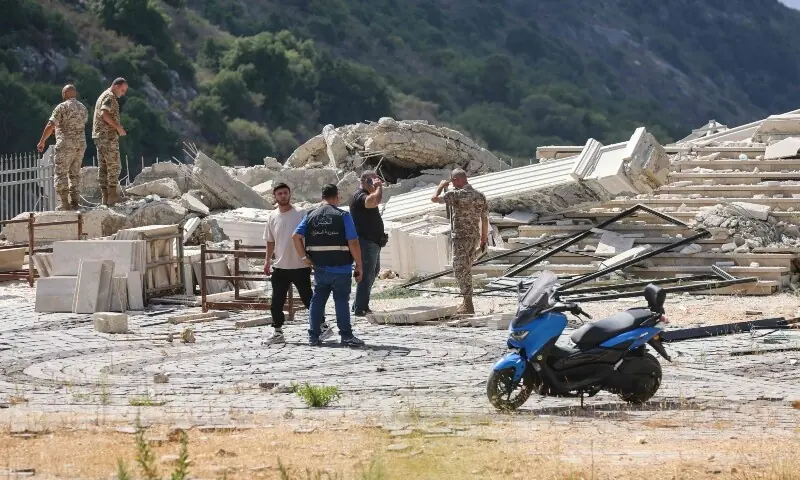 Lebanese army soldiers inspect the destruction at a site that was targeted by an Israeli airstrike in the southern Lebanese village of Arabsalim on September 6, 2026. &mdash;AFP