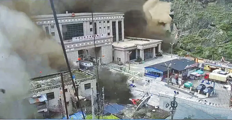 Screengrab from CCTV shows a massive mudslide striking Gyirong Port on the China-Nepal border on August 26, 2026. The entire port infrastructure was wiped away
