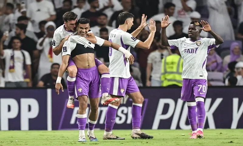 Al-Ain’s Houssine Rahimi (second L) celebrates with team-mates after scoring against Al-Nassr during their AFC Champions League Elite match at the Hazza Bin Zayed Stadium in Al-Ain on September 15, 2026. —AFP