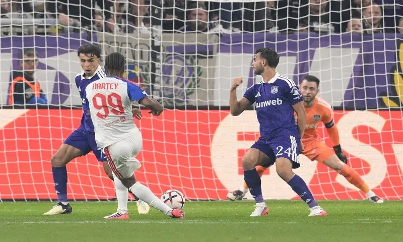 Olympique Lyonnais’ Noah Nartey (second L) scores past Anderlecht goalkeeper Colin Coosemans during their Europa League match at the Constant Vanden Stock Stadium in Anderlecht on September 16, 2026. —AFP