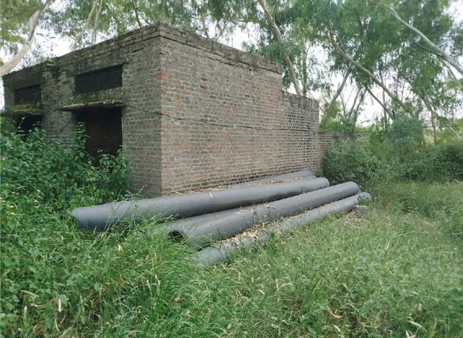 Irrigation pipes lie abandoned at Kote Raja Dam in Chakwal. — Photos by the writer