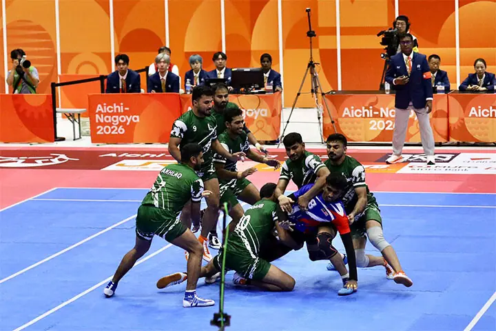   AICHI: Pakistan players in action during the kabbadi Group &lsquo;B&rsquo; match of the Asian Games against Malaysia at the Tokai Citizen Gymnasium on Monday.&mdash;Courtesy Pakistan Olympic Association  