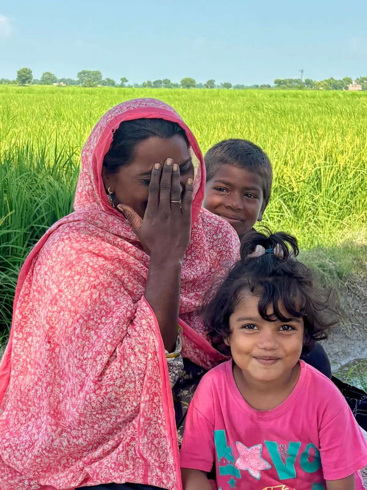 Shahida and her children in Sharifabad
