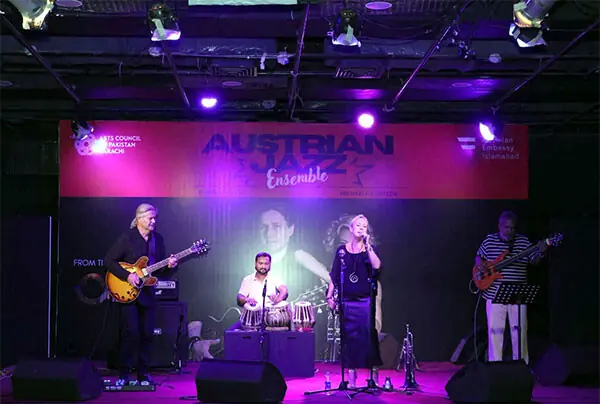 AUSTRIAN musicians Robert Pawlik and Michaela Rabitsch perform at the Karachi Arts Council event.—Dawn
