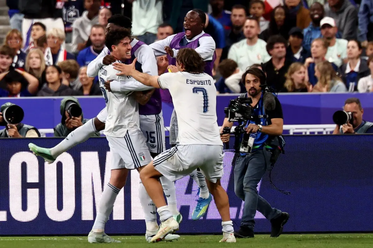 Italy’s Alessandro Bastoni (L) celebrates with team-mates after scoring against France during their UEFA Nations League, League A Group 1 match at the Stade de France Stadium in Saint-Denis, near Paris, on October 2, 2026. —AFP