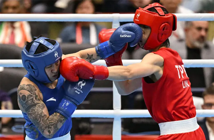   NISHIO: Taiwan&rsquo;s Lin Yu-ting (red) competes against Yang Chengyu of China during their women&rsquo;s 60kg gold medal boxing bout of the Asian Games at the Nishio Gymnasium on Friday.&mdash;AFP  