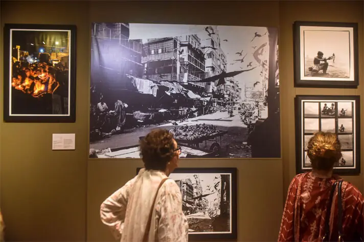 Visitors admire his works at Mohatta Palace Museum.—Fahim Siddiqi