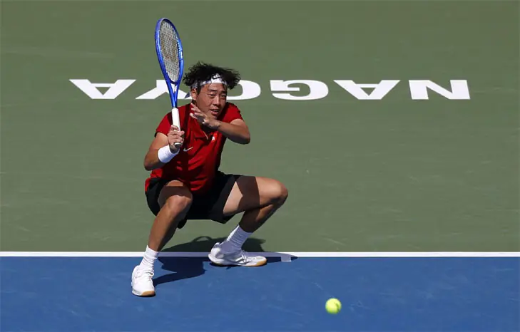 NAGOYA: Hong Kong’s Coleman Wong in action during the Asian Games tennis gold medal match against Yibing Wu of China at the Higashiyama Park Tennis Centre on Saturday.—Reuters