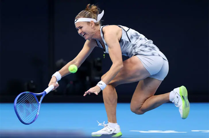 BEIJING: MARIE Bouzkova of the Czech Republic hits a return against China’s Qinwen Zheng during their China Open round-of-32 match at the National Tennis Centre on Monday.—Reuters