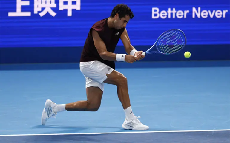  SPAIN&rsquo;S Jaume Munar hits a return against compatriot Carlos Alcaraz during their Japan Open semi final at the Ariake Colosseum on Monday.&mdash;Reuters 