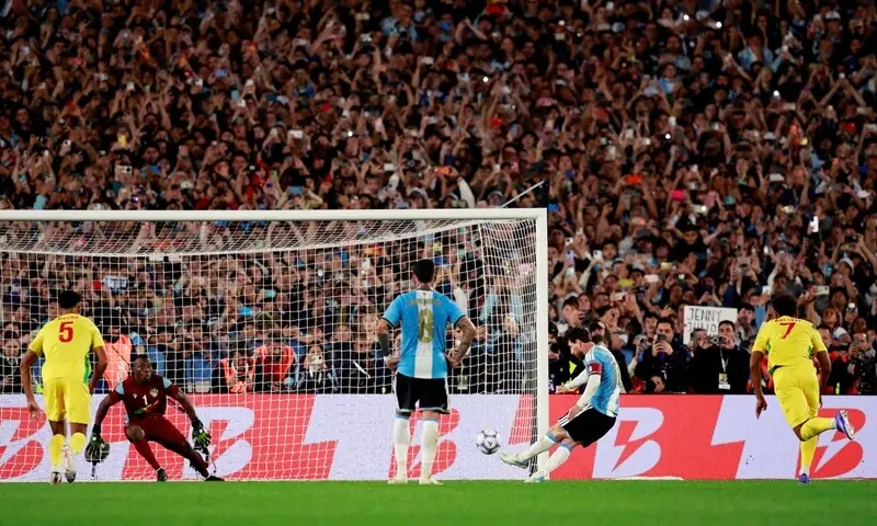 Argentina’s Lionel Messi scores from the penalty spot against Benin during their friendly match at the Mas Monumental Stadium in Buenos Aires, Argentina, on October 6, 2026. —Reuters