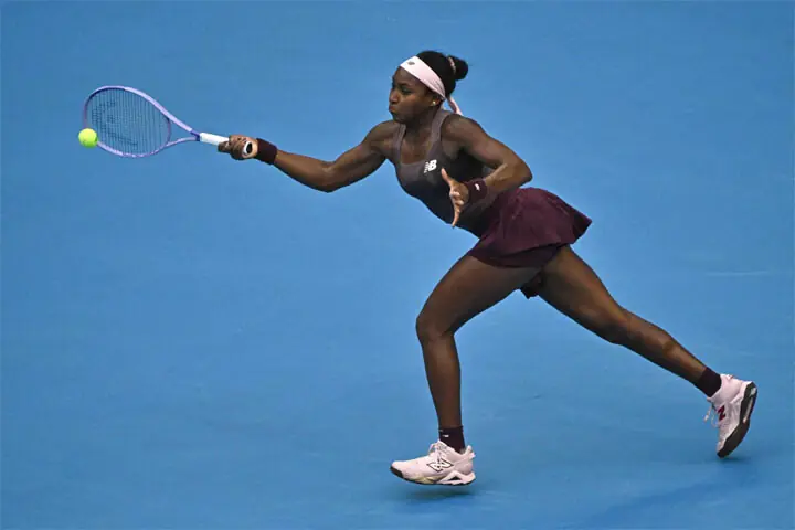 Coco Gauff of the US hits a return against Belgium’s Elise Mertens during their China Open match on Wednesday.—AFP