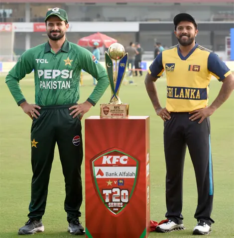  PAKISTAN captain Sahibzada Farhan (L) and his Sri Lankan counterpart Kusal Mendis pose with the T20 series trophy at the Rawalpindi Cricket Stadium on Thursday. &mdash;Tanveer Shahzad/White Star 