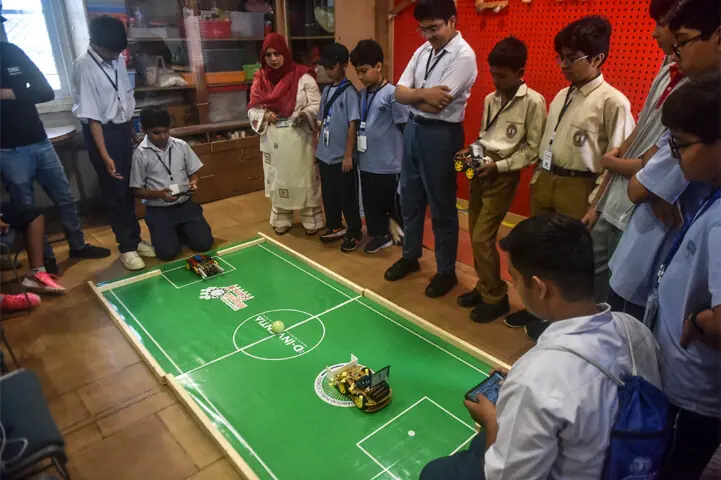  Schoolchildren take part in a robotics competition at the TDF MagnifiScience Centre. &mdash;Fahim Siddiqi/ White Star 