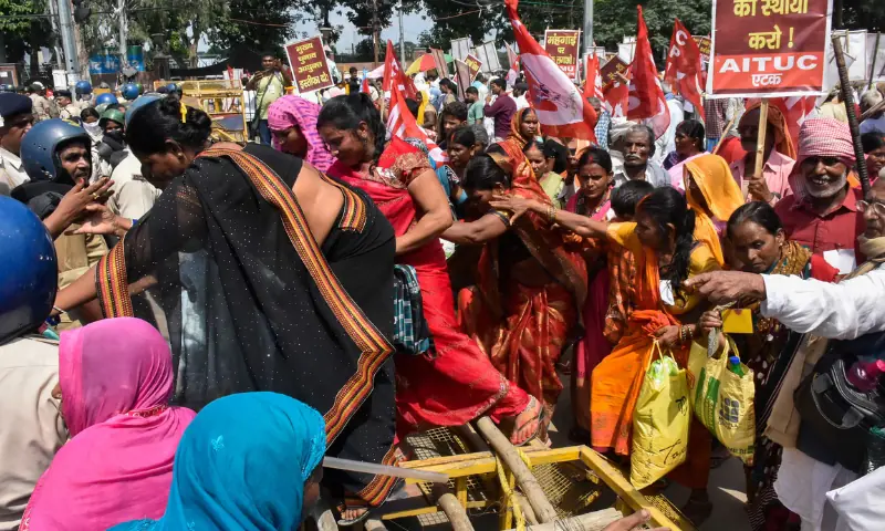 Demonstrators break the barricade as they protest demanding the resignation of Chief Election Commissioner Gyanesh Kumar, in Patna, India, on September 28, 2026. — Reuters