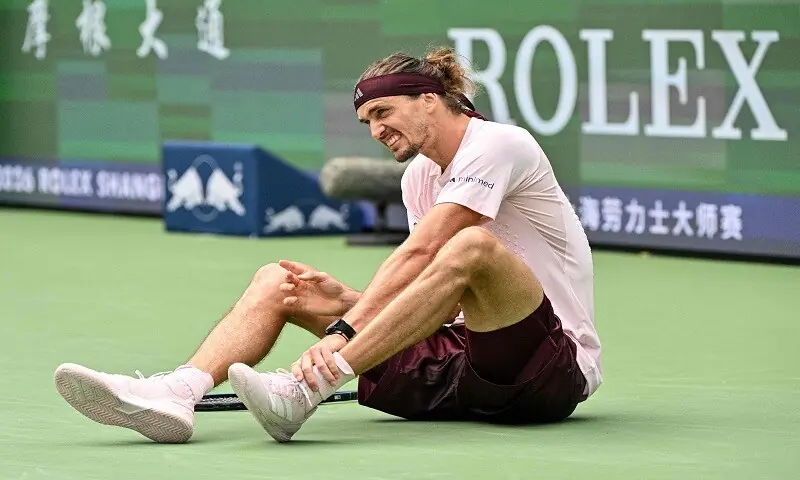 Germany&rsquo;s Alexander Zverev falls to the ground during the Shanghai Masters round-of-64 match against China&rsquo;s Yibing Wu at the Qizhong Forest Sports City Arena in Shanghai on October 9, 2026. &mdash;AFP