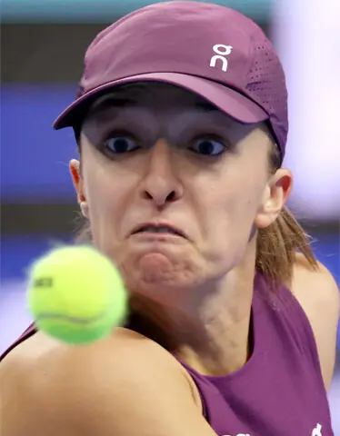 POLAND’S Iga Swiatek eyes a return during her China Open quarter-final against Elise Mertens of Belgium at the National Tennis Centre on Friday. —Reuters