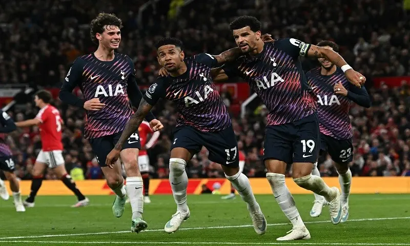 Tottenham Hotspur’s Dominic Solanke (R) celebrates with team-mates after scoring against Manchester United during their Premier League match at Old Trafford in Manchester on October 10, 2026. —AFP