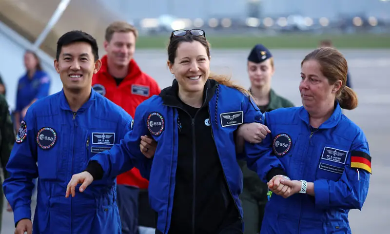 Sophie Adenot (centre), a French astronaut, in buoyant mood upon her return to Earth after nearly eight months in space. &mdash;Reuters