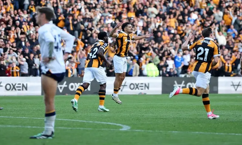 Hull City’s Mohamed Belloumi (second R) celebrates after scoring against Everton during their Premier League match at the MKM Stadium in Hull on October 11, 2026. —Reuters
