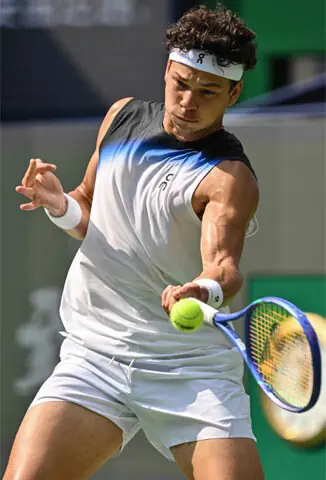 Ben Shelton of the US hits a return to France’s Arthur Gea during their Shanghai Masters match on Sunday.—AFP