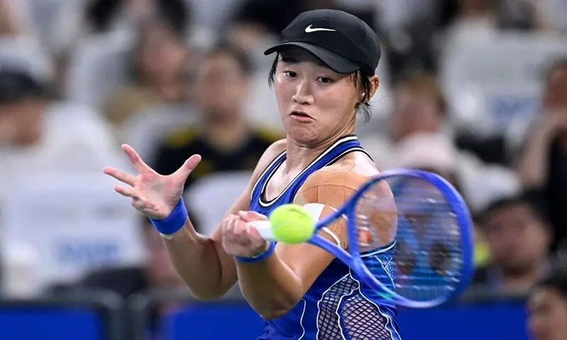 China&rsquo;s Wang Xiyu hits a forehand against compatriot Wang Xinyu during their Wuhan Open round-of-64 match at the Dongfeng Voyah Centre Court in Wuhan, China, on October 12, 2026.&mdash; AFP