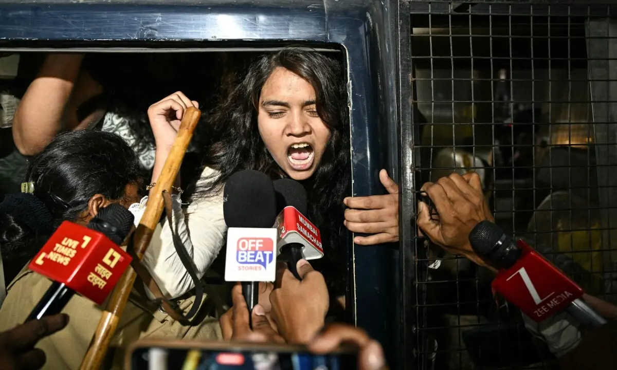 Police personnel detain supporters of the Cockroach Janata Party (CJP) during a protest demanding the resignation of India’s Chief Election Commissioner Gyanesh Kumar over alleged voter roll irregularities linked to the “special intensive revision” (SIR), in Ahmedabad on October 10, 2026. —AFP