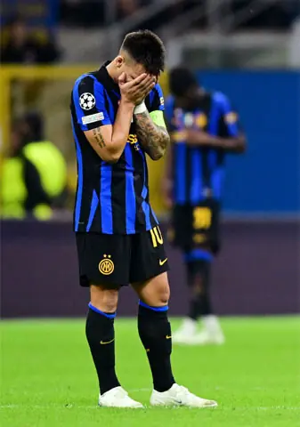 MILAN: Inter Milan’s Lautaro Martinez looks dejected after Club Brugge’s Romeo Vermant scores during their match at San Siro.—Reuters