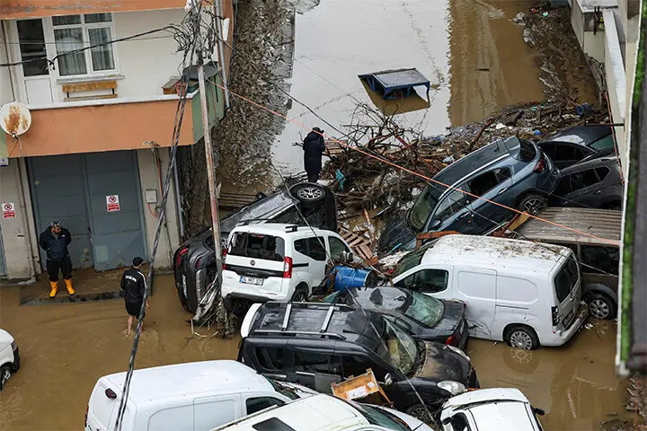 CAR owners search for their vehicles swept away by floods after heavy rains in Istanbul.—AFP
