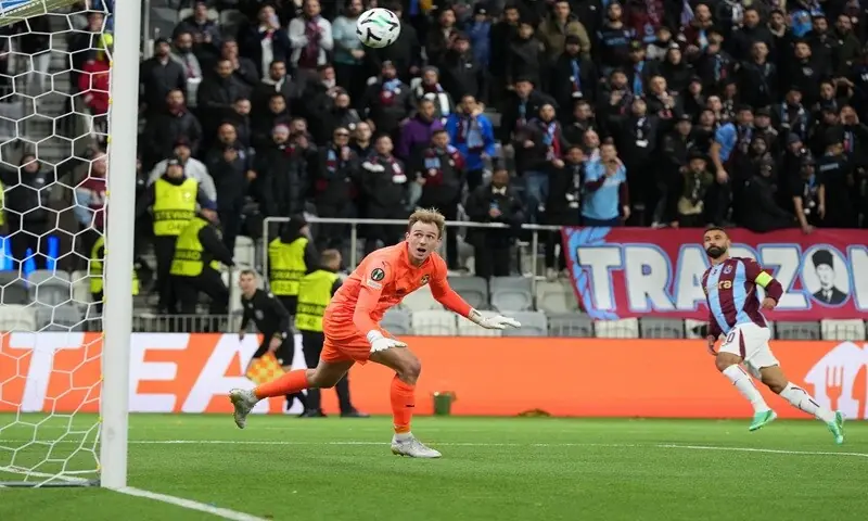 Trabzonspor’s Mohamed Salah scores past KuPS goalkeeper Johannes Kreidl during their UEFA Conference League first-round match at the Tammelan Stadion in Tampere, Finland, on October 15, 2026. —Reuters