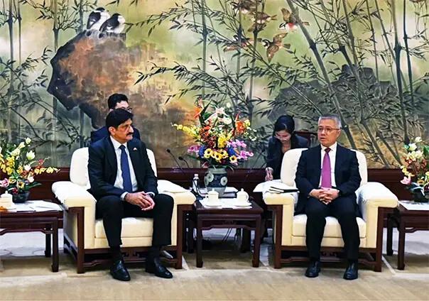 Chief Minister Murad Ali Shah discusses urban issues with Shanghai Mayor Zhu Zhongming in China.—Dawn