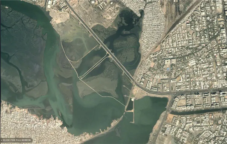 Satellite images from 2000 and 2025 show mangroves near Mai Kolachi replaced by reclaimed land.—Courtesy Suparco