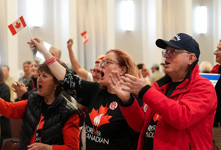 SUPPORTERS of the Forever Canadian group rejoice after Alberta voted to remain part of Canada.—Reuters