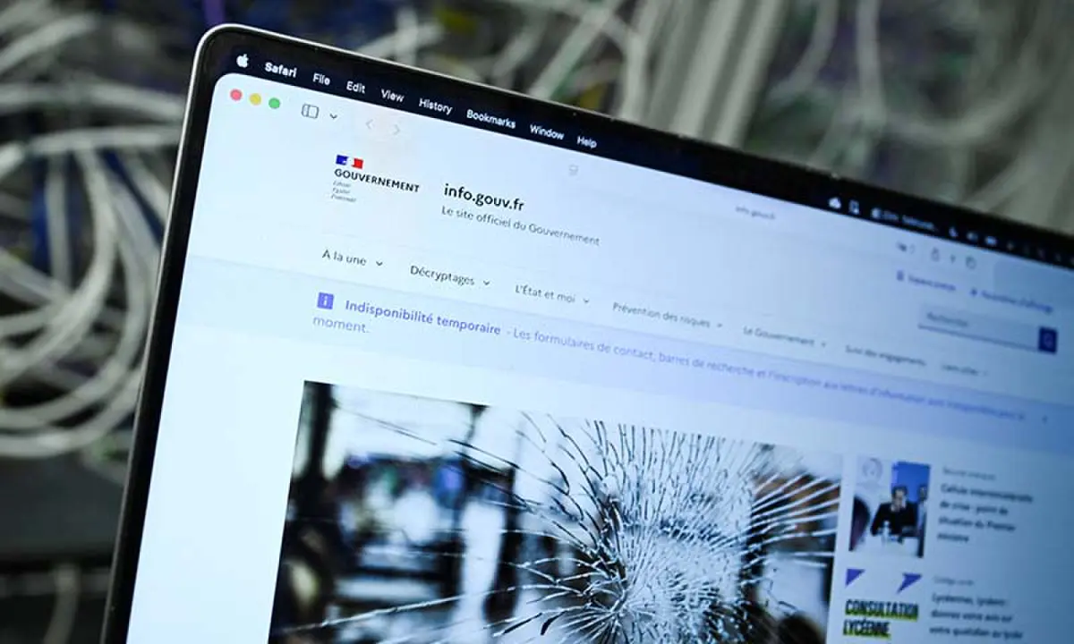 A screen displays the unavailable French government website, info.gouv.fr, as cyber agencies warn that websites may be taken offline while PHP prepares a critical fix, in Berlin, Germany on October 21, 2026. &mdash; Reuters
