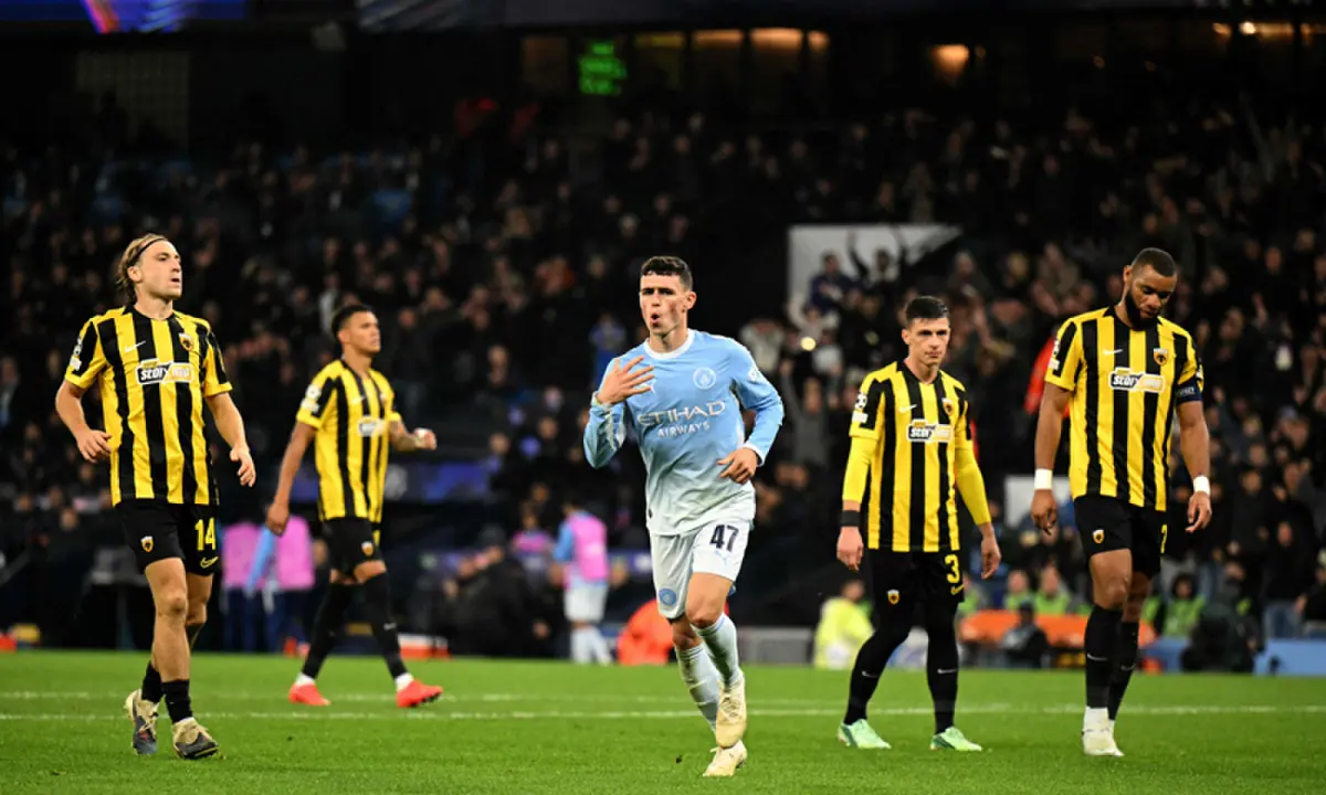  MANCHESTER: Phil Foden of Manchester City celebrates after scoring against AEK Athens during their first-round match at the Etihad Stadium.&mdash;AFP 
