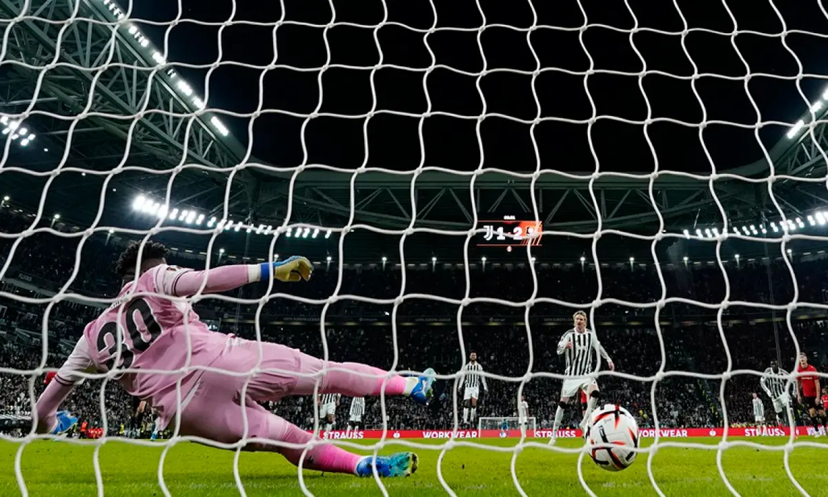 Juventus&rsquo; Nick Woltemade scores from the penalty spot past Rennes goalkeeper Brice Samba during their UEFA Europa League first-round match at the Allianz Stadium in Turin, Italy, on October 22, 2026. &mdash;Reuters