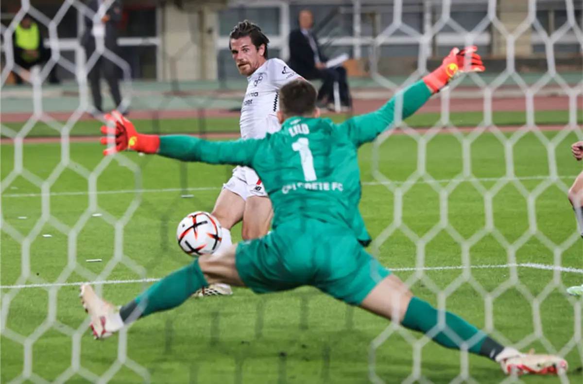  HERAKLION (Greece): Bayer Leverkusen&rsquo;s Jonas Hofmann scores past OFI Crete goalkeeper Klidman Lilo during their Europa League first-round match at the Pankritio Stadium.&mdash;AFP 