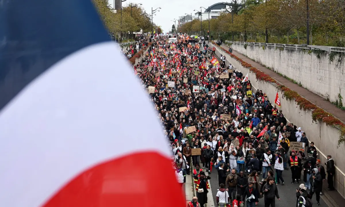 Protesters march along the Avenue Jean Zay during a demonstration ‘against racism, fascism and imperialism’ on the sidelines of the Congress of the Far-right party Rassemblement National (RN) in Orleans, central France on October 24, 2026. — AFP