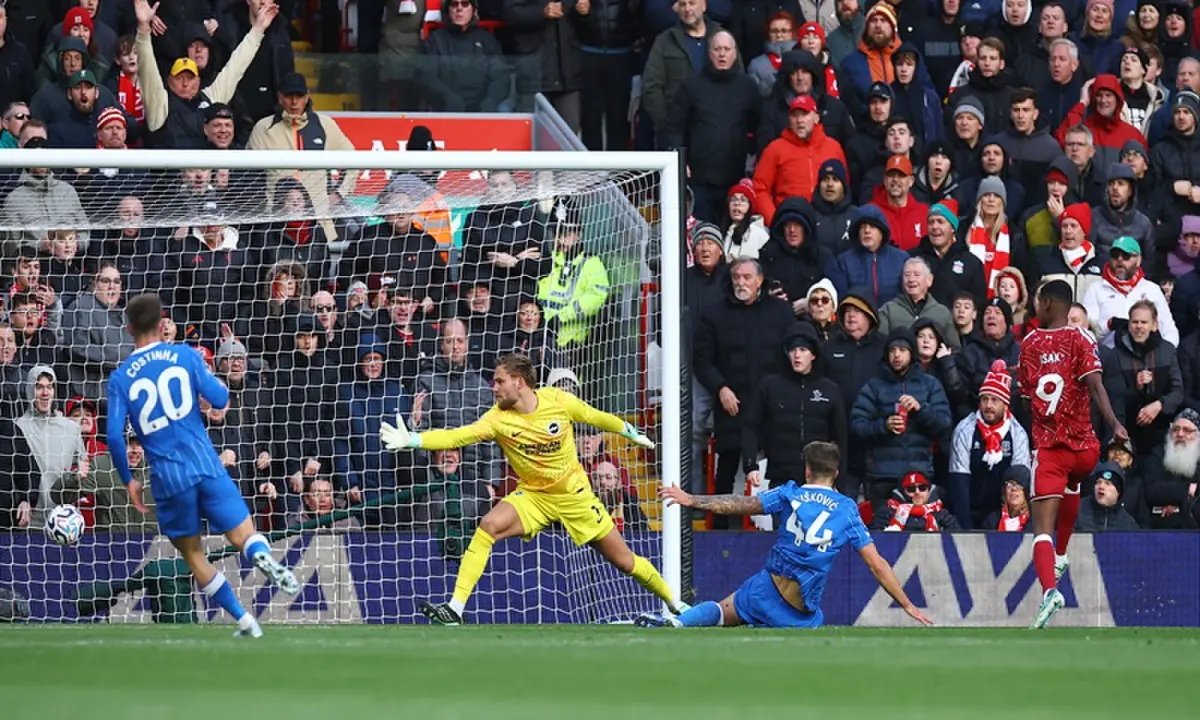 Liverpool&rsquo;s Alexander Isak scores past Brighton and Hove Albion&rsquo; goalkeeper Bart Verbruggen during the English Premier League match at Anfield in Liverpool on October 25, 2026. &mdash;Reuters