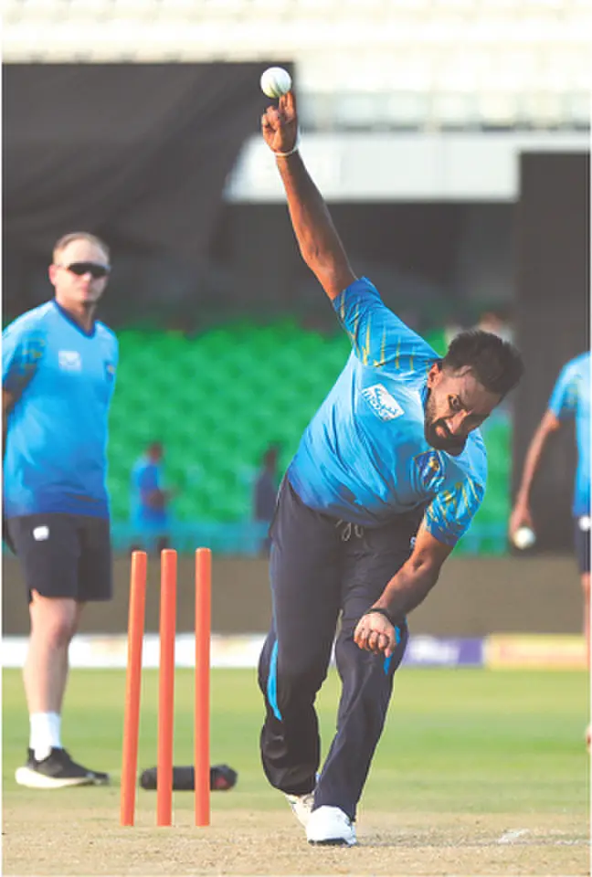 LAHORE: Sri Lankan pacer Eshan Malinga bowls during a net practice session at the Gaddafi Stadium on Monday.—Courtesy PCB