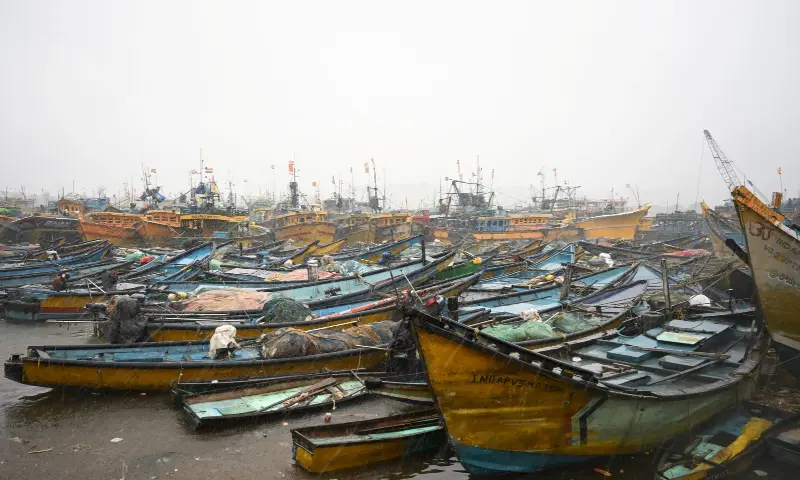 Docked boats along the harbour amid rain and gusty winds as Cyclone Arnab approaches, in Visakhapatnam, Andhra Pradesh, India, on October 27, 2026. — Reuters