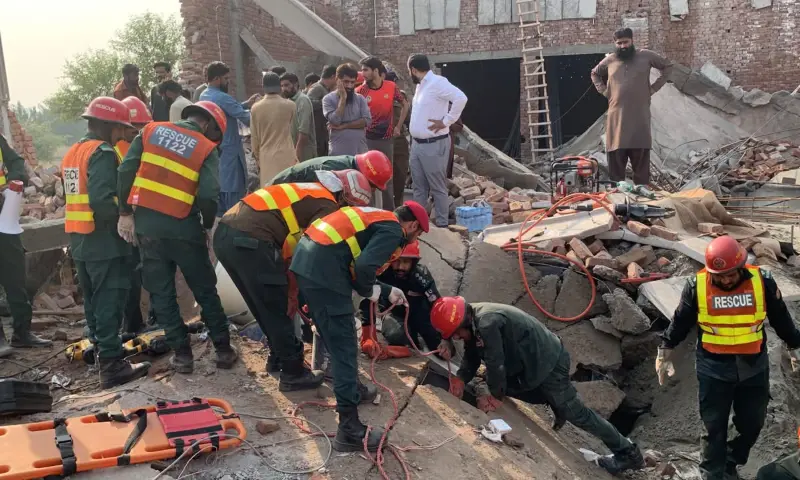 Rescue officials launch a search and rescue operation after building collapse in Multan on October 27, 2026. — Photo via Rescue 1122