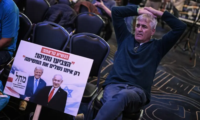 A supporter of the Likud party leader and Prime Minister Benjamin Netanyahu waits at the election night rally in Jerusalem on October early on 28, 2026. — AFP